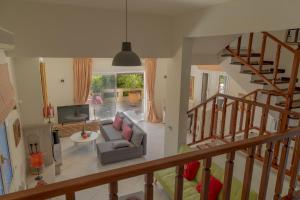 Televiisor ja/või meelelahutuskeskus majutusasutuses Private Pet Friendly Villa