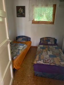 Ένα ή περισσότερα κρεβάτια σε δωμάτιο στο Viola villa