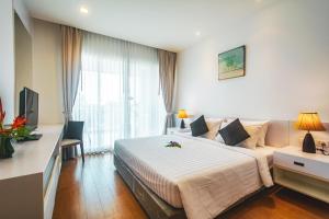 Giường trong phòng chung tại Krabi One Bedroom Seaview +13 ảnh