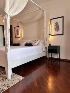 Postel nebo postele na pokoji v ubytování B&B RIO GRANDE