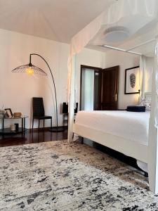 Postel nebo postele na pokoji v ubytování B&B RIO GRANDE