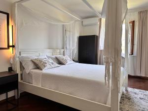 Postel nebo postele na pokoji v ubytování B&B RIO GRANDE