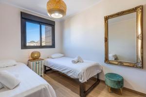Postel nebo postele na pokoji v ubytování Jardines de Gorgos apartamento