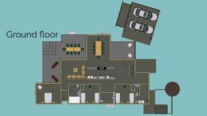 ein Grundriss des Erdgeschosses eines Hauses in der Unterkunft Pelican Escape Executive Home in Cams Wharf