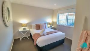 Katil atau katil-katil dalam bilik di The Sanctuary at Catherine Hill Bay +16 gambar