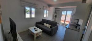 Posedenie v ubytovaní Atico con terraza Frente Playa Pedregalejo