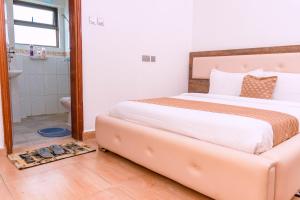 Postel nebo postele na pokoji v ubytování Havan Furnished Apartment-Shawmut