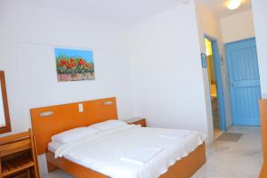 Postel nebo postele na pokoji v ubytování Danae Hotel