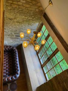 Posezení v ubytování Le Gîte du Château Kervolongar