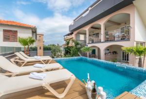 an image of a villa with a swimming pool at Top View Biograd in Biograd na Moru
