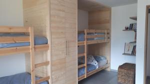 a room with bunk beds in a dorm room at SCI Francau in Valdeblore