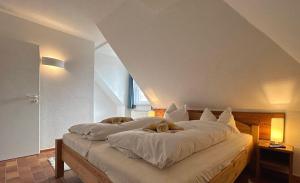 Postel nebo postele na pokoji v ubytování Resi H5