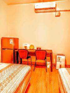 Katil atau katil-katil dalam bilik di Yun Cheng Homestay