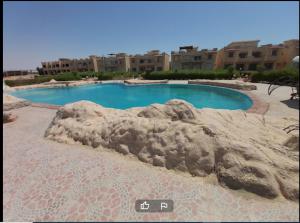 Sundlaugin á Beach and pools front challet in Ras Sudr families Only عائلات فقط eða í nágrenninu