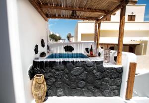 Φωτογραφία από το άλμπουμ του Asera Suites - Prive jacuzzi στο Καμάρι