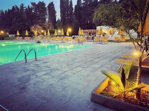 The swimming pool at or close to Relais Casina Copini