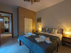 Posteľ alebo postele v izbe v ubytovaní New Sea & Sun House