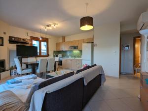 Posteľ alebo postele v izbe v ubytovaní New Sea & Sun House