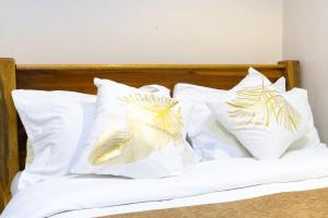 Mayas Suites客房内的一张或多张床位