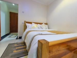 Mayas Suites客房内的一张或多张床位