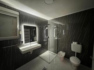 Ванная комната в Hotel Villa Nadin