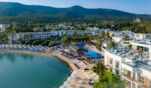 an aerial view of a resort with a beach at Samara Hotel Bodrum Ultra All Inclusive in Torba