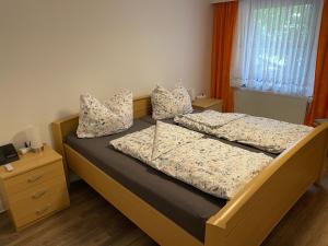 Posteľ alebo postele v izbe v ubytovaní FeWo an der Küste