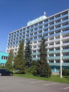 a large building with a sign on top of it at Parkcentrum lowcost hotel near center of Ostrava in Jáma Jindřich