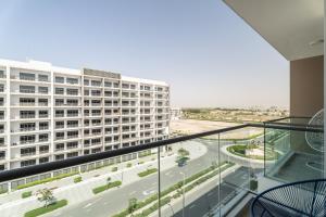 a view from the balcony of a building at Nasma Luxury Stays - Laya Heights in Dubai