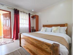 Mayas Suites客房内的一张或多张床位