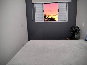 Postel nebo postele na pokoji v ubytování ap3 apropriado para arbnb! + 8 fotografií