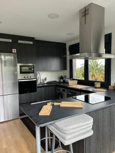 Kuchyň nebo kuchyňský kout v ubytování Villa los corzos