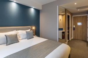 Ліжко або ліжка в номері Holiday Inn Express Ajaccio by IHG