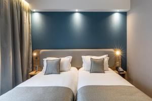 Ліжко або ліжка в номері Holiday Inn Express Ajaccio by IHG