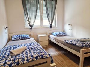 Ένα ή περισσότερα κρεβάτια σε δωμάτιο στο Croparadise Hostel