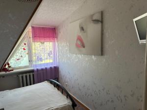 Postel nebo postele na pokoji v ubytování Huntaugu kodumajutus