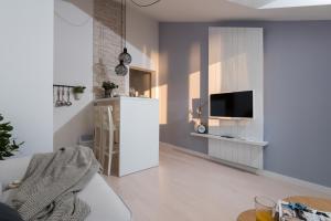 TV a/nebo společenská místnost v ubytování BonaMare Apartments II