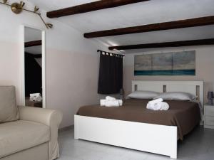 A bed or beds in a room at DUCEZIO rooms