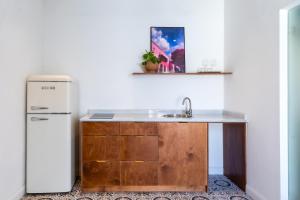 Kuchyň nebo kuchyňský kout v ubytování Mila - Boutique Hotel