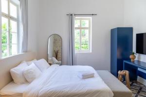 Postel nebo postele na pokoji v ubytování Mila - Boutique Hotel