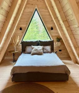 Postel nebo postele na pokoji v ubytování Forest spirit