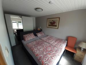 Säng eller sängar i ett rum på Zu den Ravensbergen