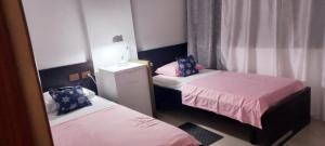 Postel nebo postele na pokoji v ubytování ART Apartment Durres Albania