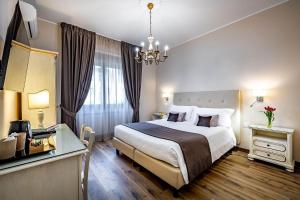 Postel nebo postele na pokoji v ubytování La Corte di Ripoli