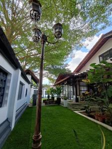 a street light in the yard of a house at The Syawal in Johor Bahru