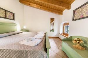 Cama o camas de una habitación en Agriturismo Colombare Teboi Bilo
