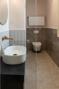 Koupelna v ubytování Mila - Boutique Hotel