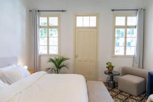 Postel nebo postele na pokoji v ubytování Mila - Boutique Hotel