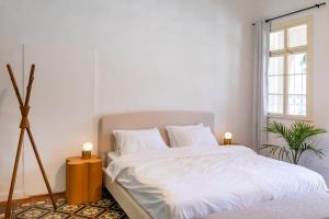 Postel nebo postele na pokoji v ubytování Mila - Boutique Hotel