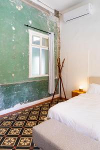 Postel nebo postele na pokoji v ubytování Mila - Boutique Hotel